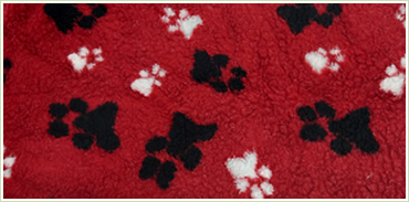 Red Snuggle Sack with White and Black Paws